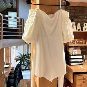 Romper, size small, never worn tags still on